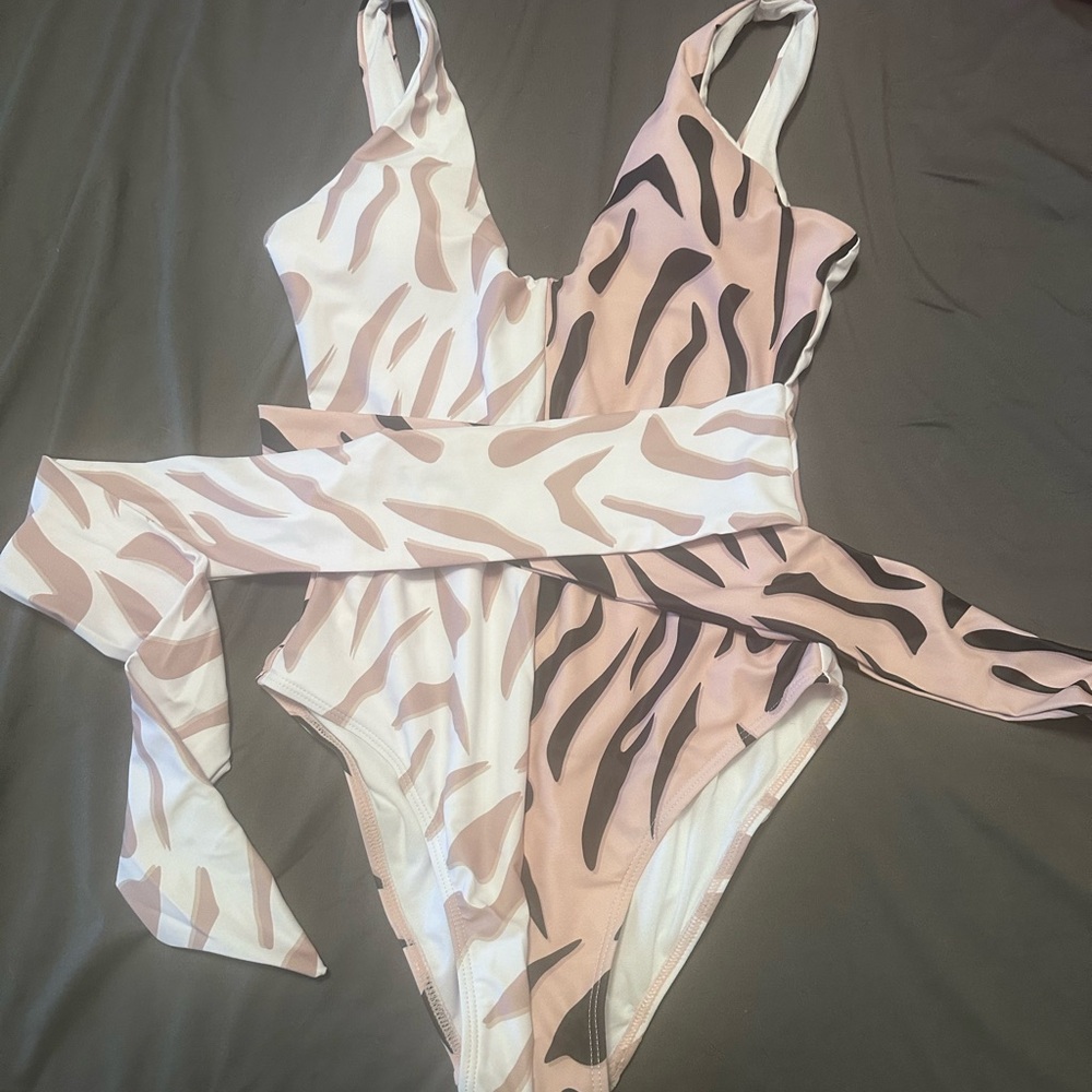 Brand new- never worn one piece swim suit
